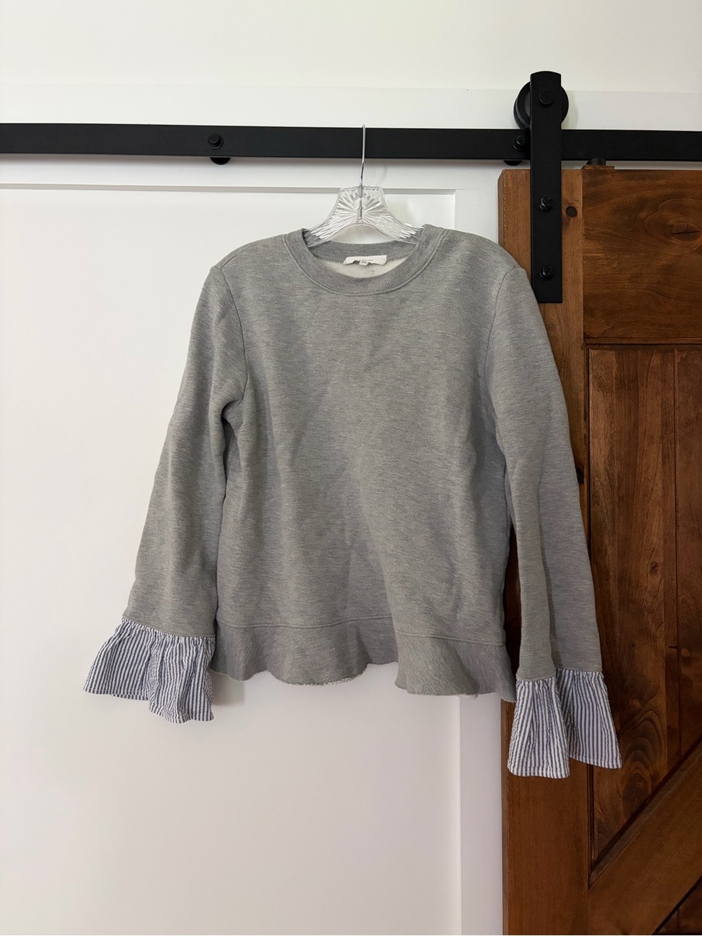 gray sweatshirt with embellished striped cuffs